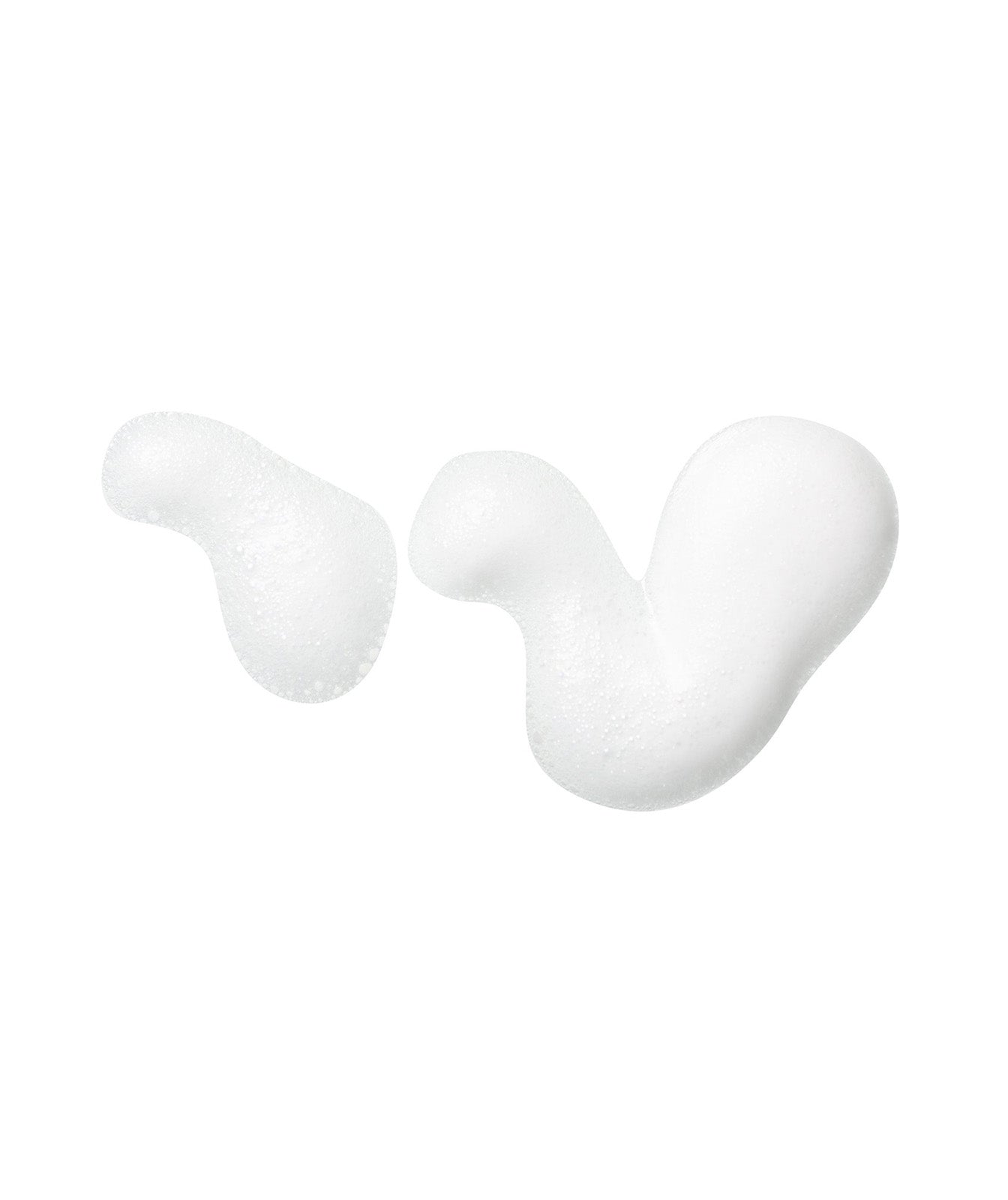 Imagen secundaria de la espuma fuera de su envase en concreto en un fondo blanco elegante que hace destacar sus burbujas.